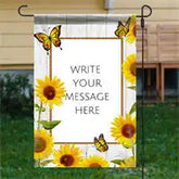 Decorative garden flag with sunflowers and butterflies framing a blank message area.